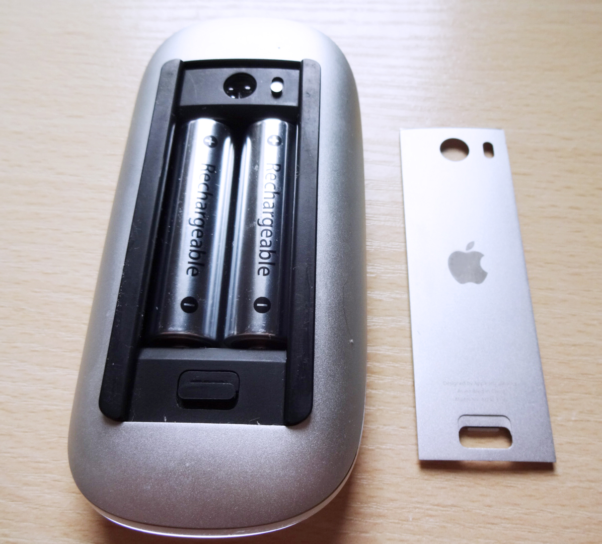 Apple mouse and battery.