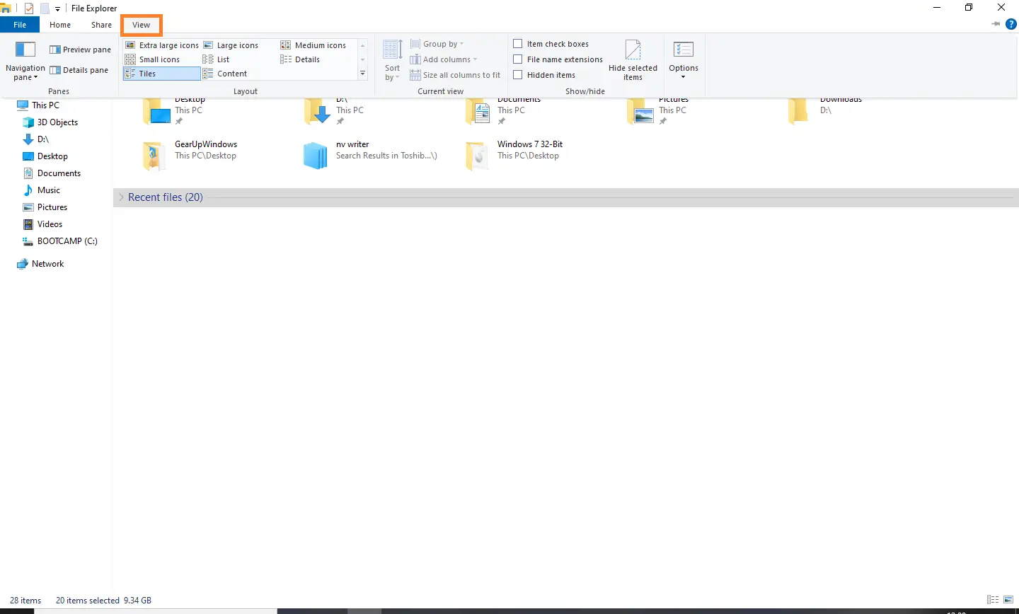 Find and delete the file named IconCache.db
Open Task Manager by pressing Ctrl+Shift+Esc