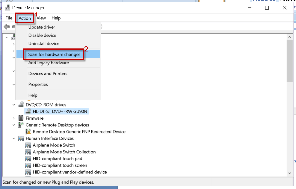 In the Device Manager window, click on the Action tab.
Select Scan for hardware changes.