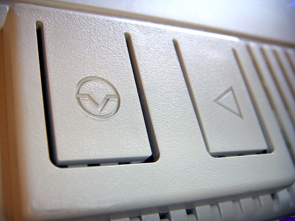 Mac computer with a reset button
